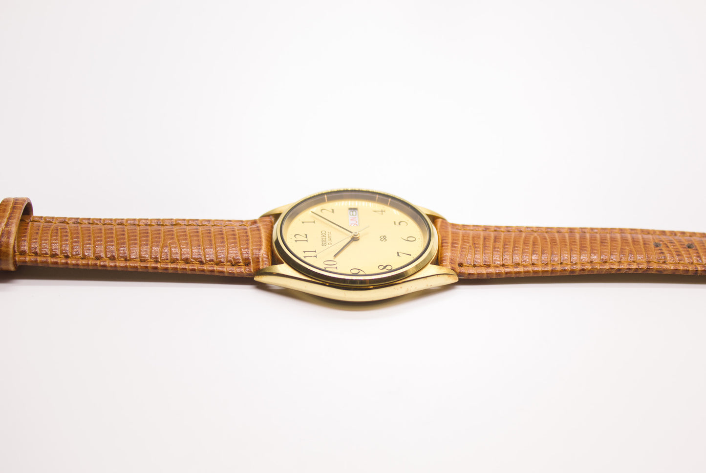 Near Mint 1983 Seiko Quartz Gold Toned Men's Wrist-Watch W/Box & Papers