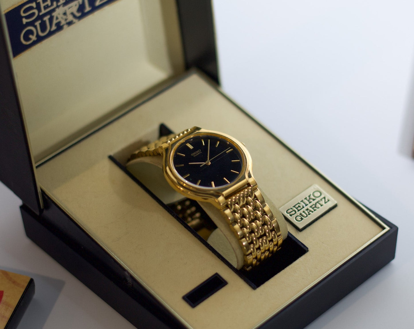1990 Seiko Gold Toned Beads of Rice Jet Black Dial Men's Wrist-Watch W/Box