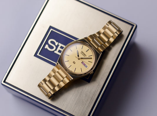 [New Old Stock] 1985 Seiko SQ Quartz Golden Dial Men's Wrist-Watch W/Box & Papers