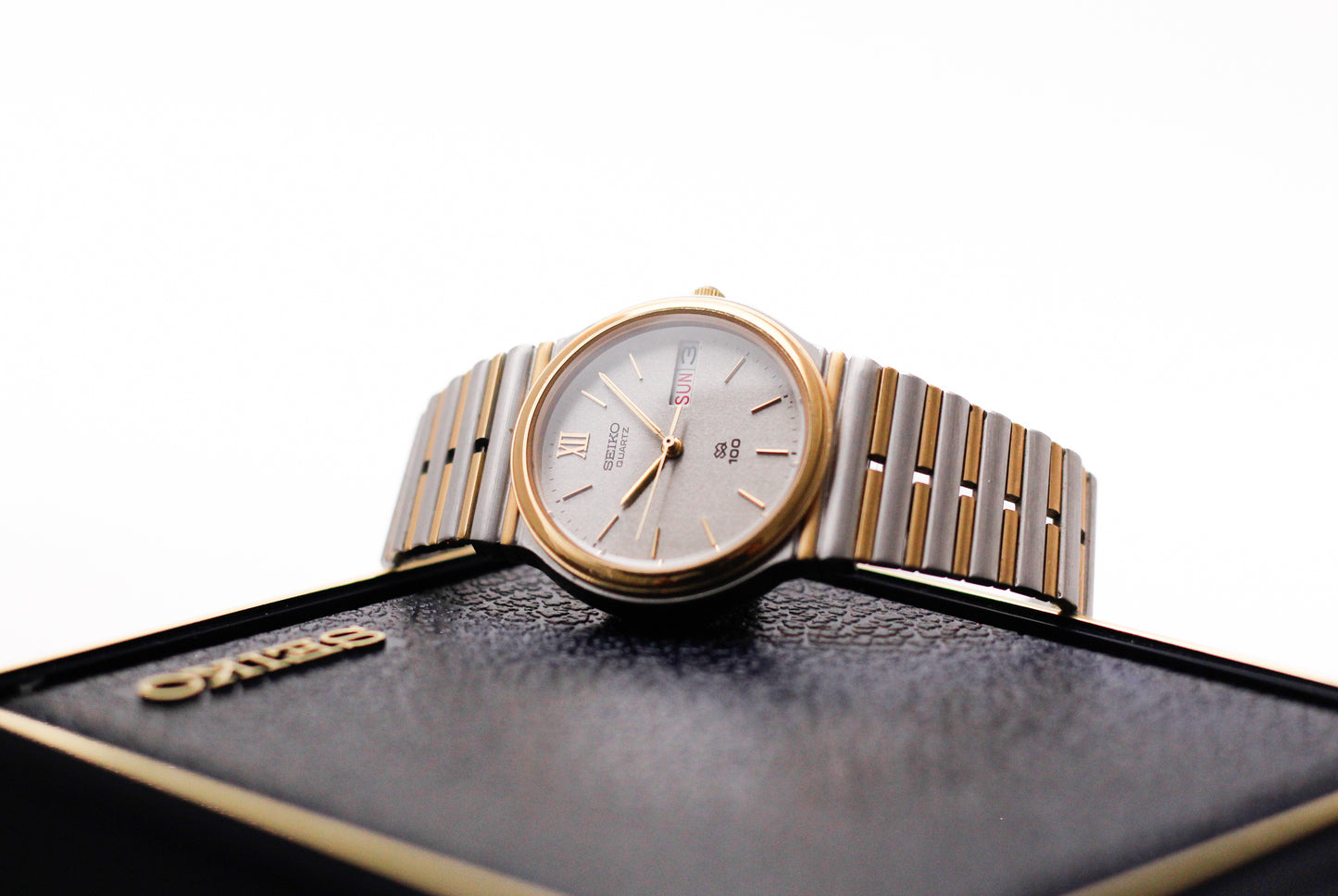 1985 Seiko SQ 100 Textured Gray Dial Two Tone Men's Wrist-Watch W/Box