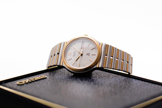 1985 Seiko SQ 100 Textured Gray Dial Two Tone Men's Wrist-Watch W/Box