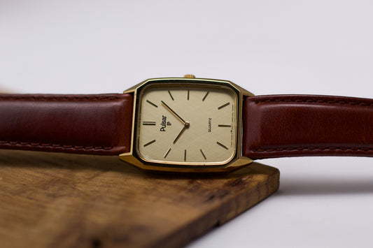 1994 Pulsar Quartz Linen Golden Dial Tank Men's Wrist-Watch