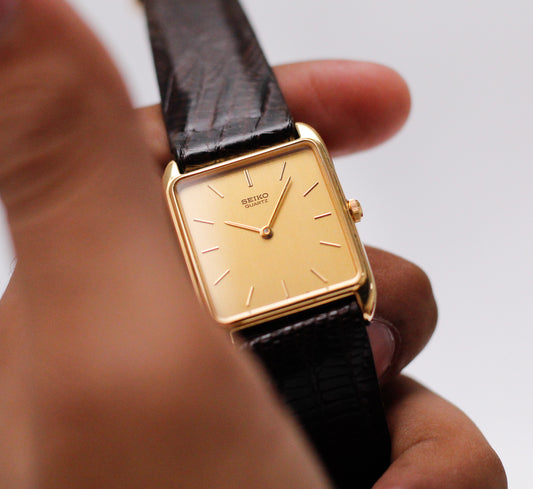 1984 Seiko Quartz Straight Grain Golden Dial Tank Men's Wrist-Watch
