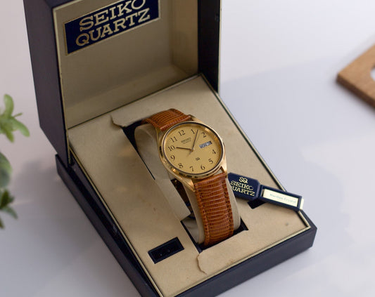 Near Mint 1983 Seiko Quartz Gold Toned Men's Wrist-Watch W/Box & Papers