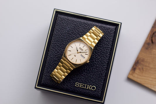 1985 Seiko SQ Cream Golden Dial Men's Wrist-Watch W/Box & Papers