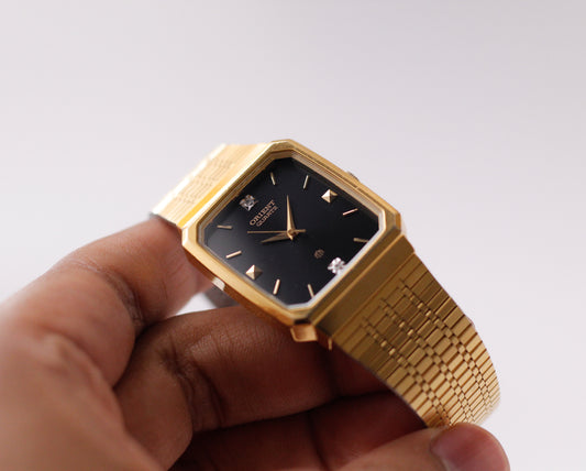 1990s Orient Quartz Sunburst Black Dial Men's Wrist-Watch