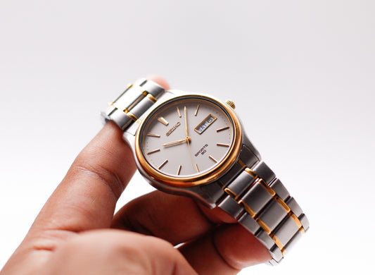 1995 Seiko Quartz Sports 50 Straight Grain Gray Dial Two Tone Case Men's Wrist-Watch