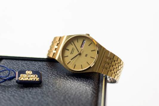 1980 Seiko SQ Cross Grain Textured Golden Dial Men's Wrist-Watch W/Box & Tag