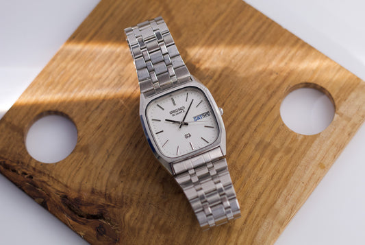 1983 Seiko SQ Straight Grain Silver Dial Men's Wrist-Watch