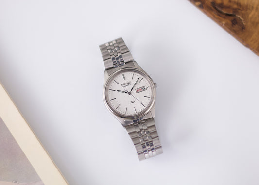 1988 Seiko Quartz Straight Grain Silver Dial Men's Wrist-Watch