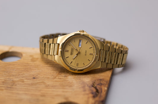 1988 Seiko SQ 100 Matte Sunburst Golden Dial Men's Wrist-Watch