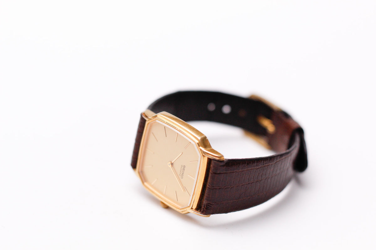 1983 Seiko Quartz Straight Grain Golden Dial Tank Men's Wrist Watch