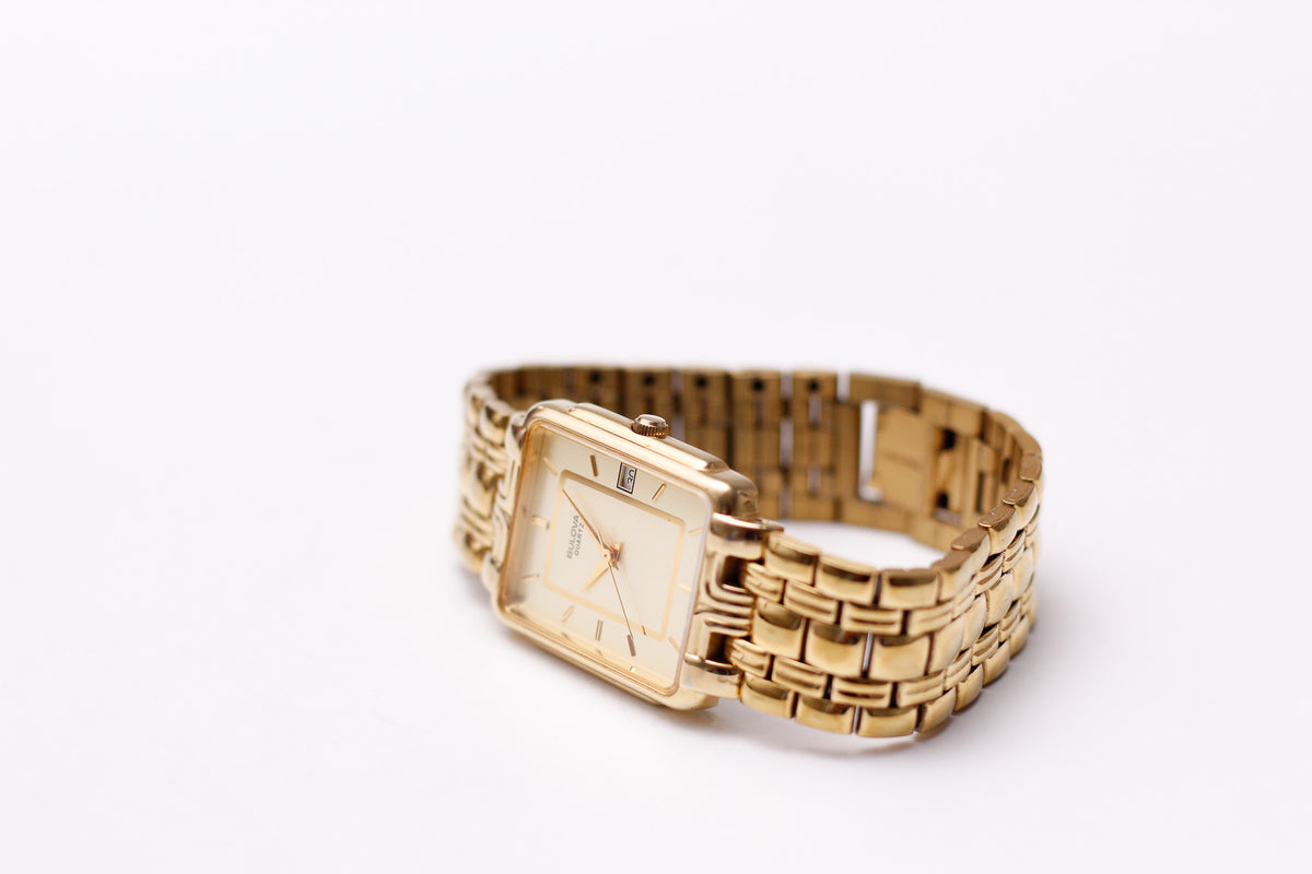 1990s Bulova Quartz Straight Grain Golden Dial Men's Wrist-Watch