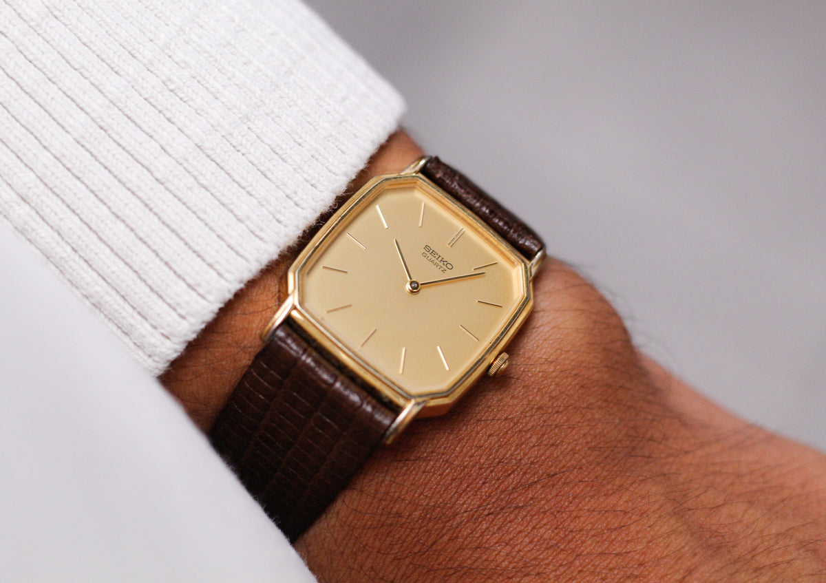 1983 Seiko Quartz Straight Grain Golden Dial Tank Men's Wrist Watch