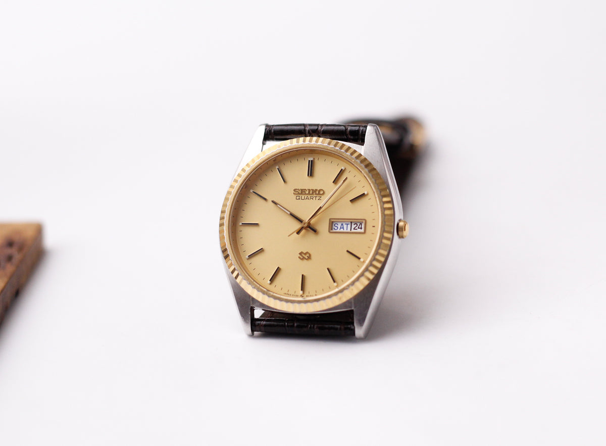 1989 Seiko SQ Golden Sunburst 'Baby Day-Date' Two Tone Case Men's Wrist-Watch