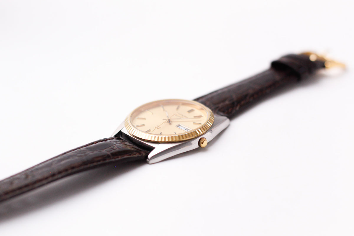 1989 Seiko SQ Golden Sunburst 'Baby Day-Date' Two Tone Case Men's Wrist-Watch
