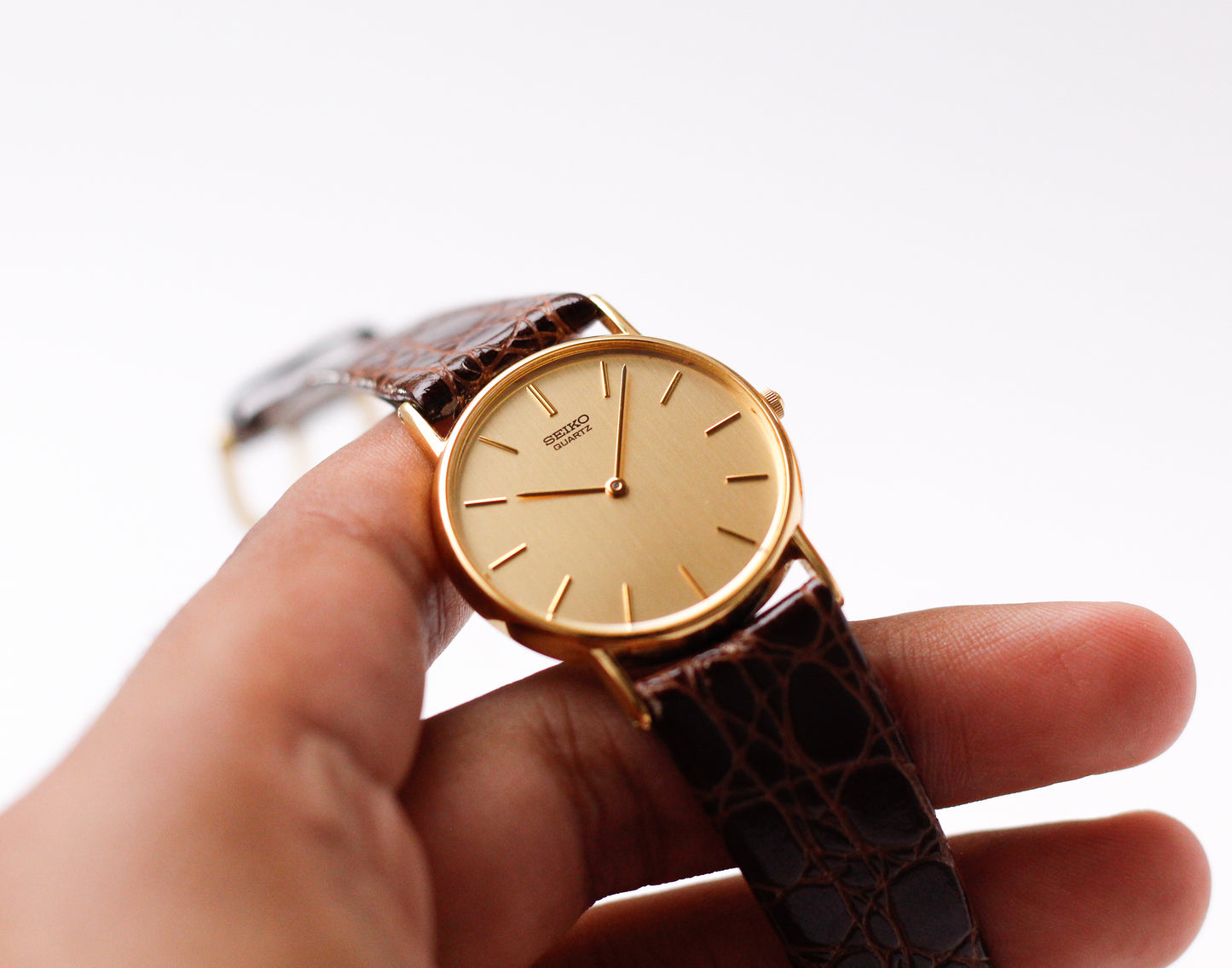 1990 Seiko Quartz Gold Straight Grain Dial Men's Wrist Watch