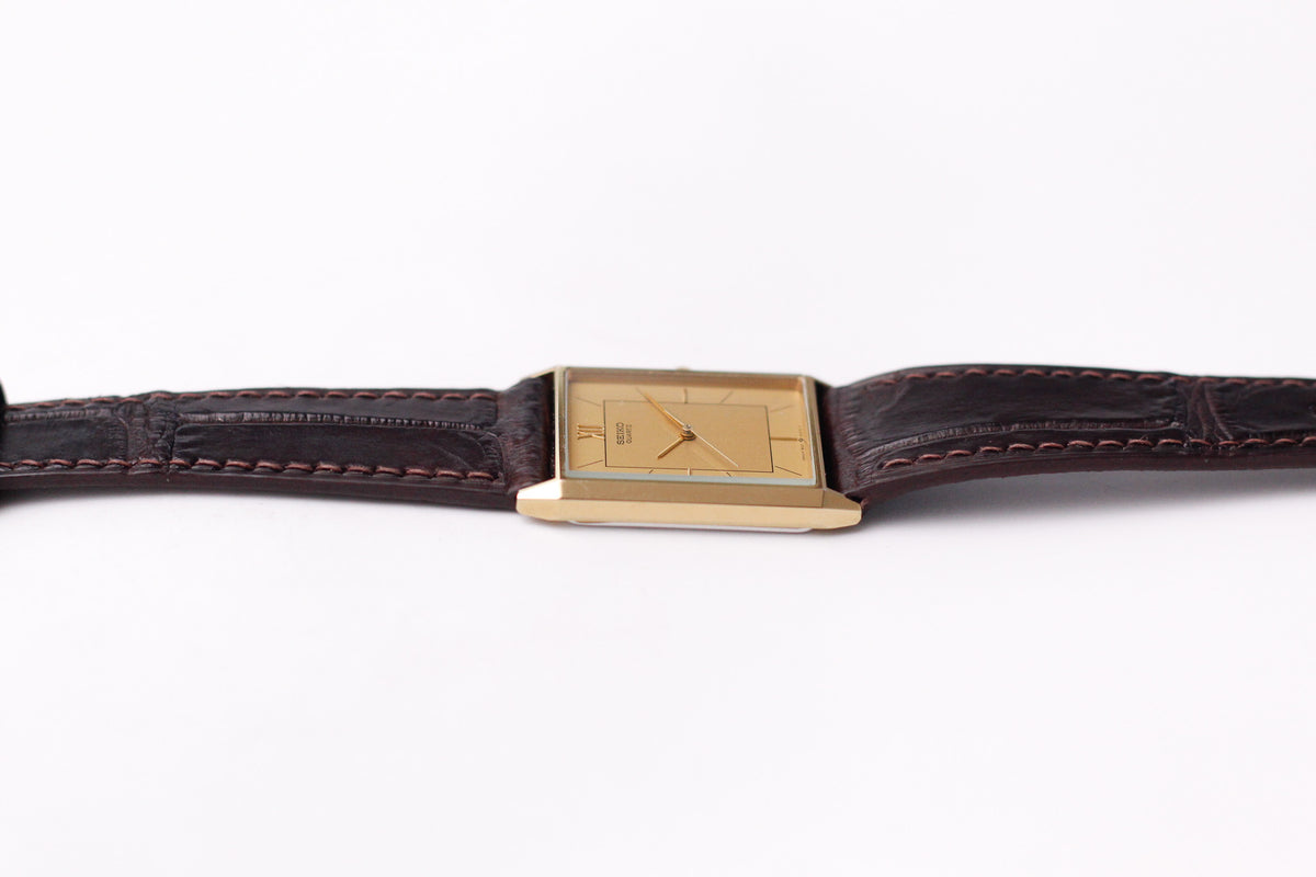 1986 Seiko Quartz Straight Grain Golden Dial Tank Men's Wrist-Watch