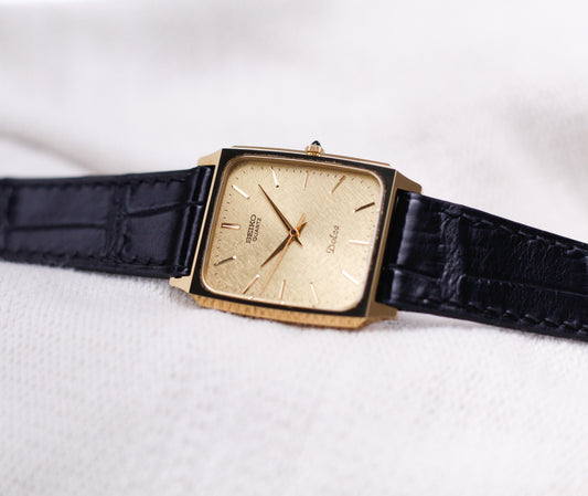 1985 Seiko Dolce Quartz Vibrant Golden Snowflake Dial Men's Wrist-Watch
