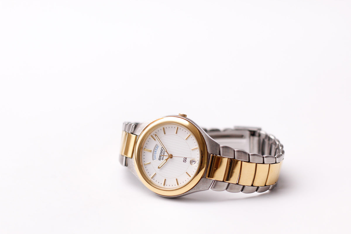 2001 Seiko SQ Quartz Pinstripe White Dial Two Tone Case Wrist-Watch