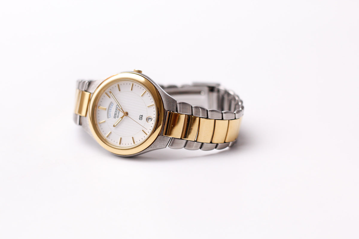 2001 Seiko SQ Quartz Pinstripe White Dial Two Tone Case Wrist-Watch