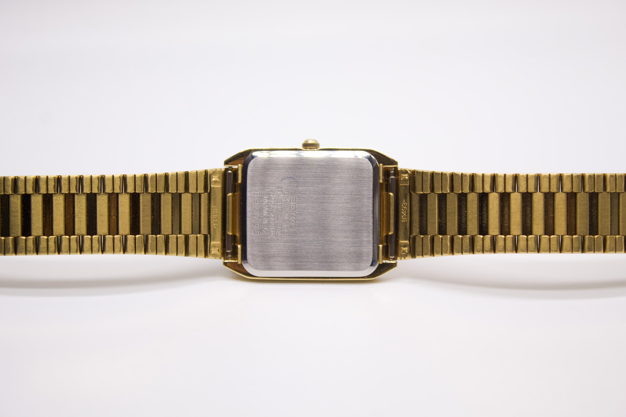 New Old Stock] 1986 Seiko SX Tank Straight Grain Golden Dial Men's