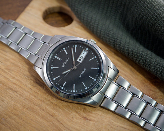 1990s Seiko Titanium Matte Gray Men's Quartz Wrist-Watch
